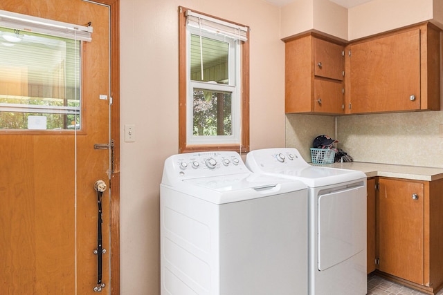 2639 Dutch Acres, Allegan, MI 49010 - laundry room with cabinet space and washing machine and clothes dryer