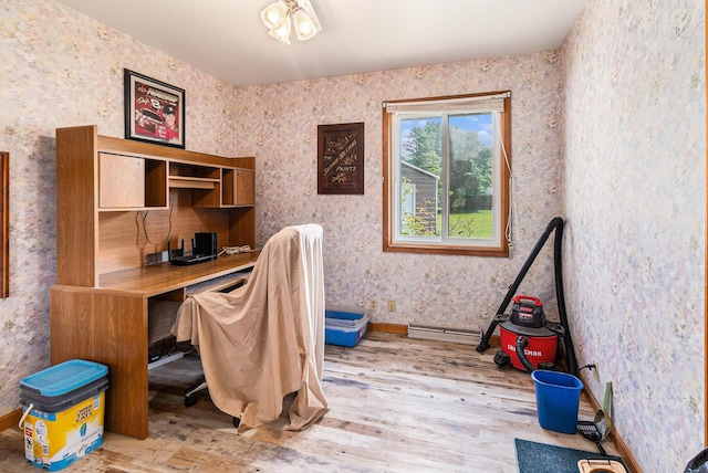 2639 Dutch Acres, Allegan, MI 49010 - office area with light wood-style floors, wallpapered walls, and baseboards