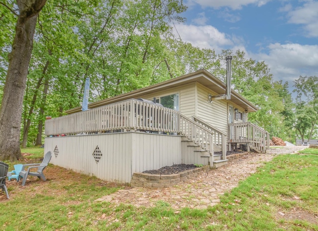 493 Swan Ln, Coldwater, MI 49036 - view of side of property with stairway and a deck