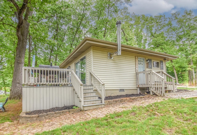 493 Swan Ln, Coldwater, MI 49036 - rear view of property with crawl space, a wooden deck, and stairs