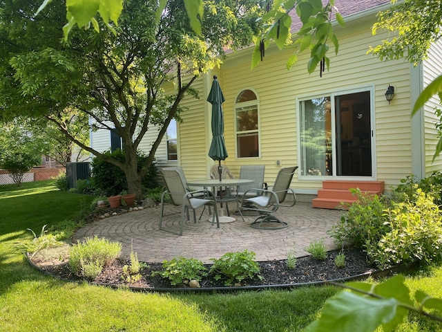1432 Auston Ln, Chelsea, MI 48118 - view of patio / terrace with entry steps and central AC