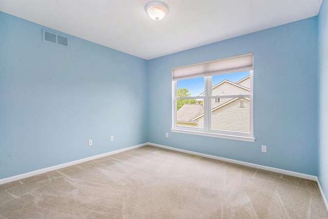 1432 Auston Ln, Chelsea, MI 48118 - spare room with baseboards and carpet