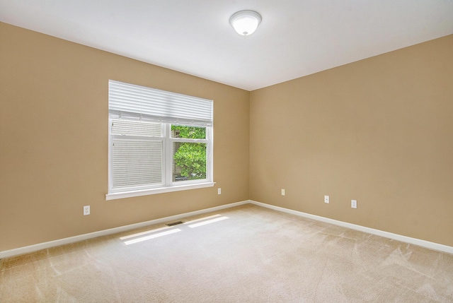 1432 Auston Ln, Chelsea, MI 48118 - empty room featuring light colored carpet and baseboards