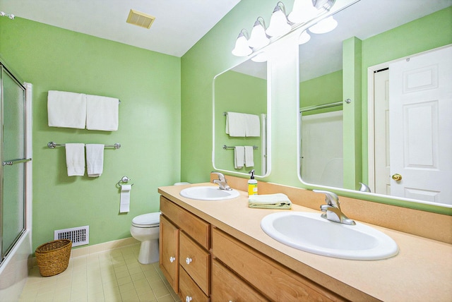 1432 Auston Ln, Chelsea, MI 48118 - bathroom with tile patterned flooring, double vanity, toilet, and baseboards