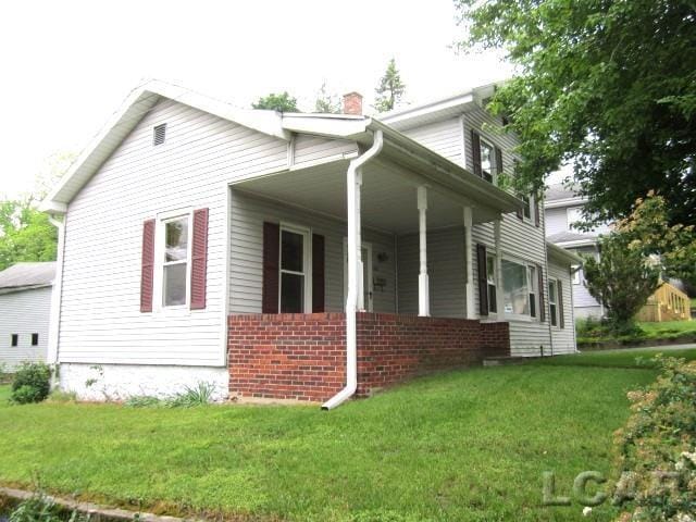 107 Seward St, Hudson, MI 49247 - photo 1