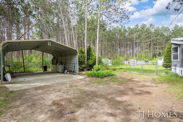 3010 E 96th St, Newaygo, MI 49337 - view of yard with a gate and a carport