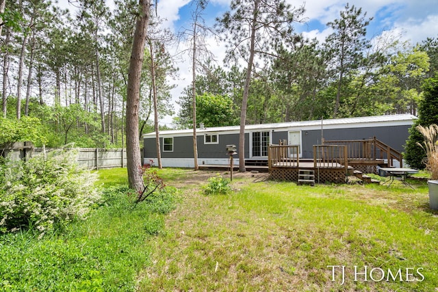 3010 E 96th St, Newaygo, MI 49337 - rear view of property featuring a deck