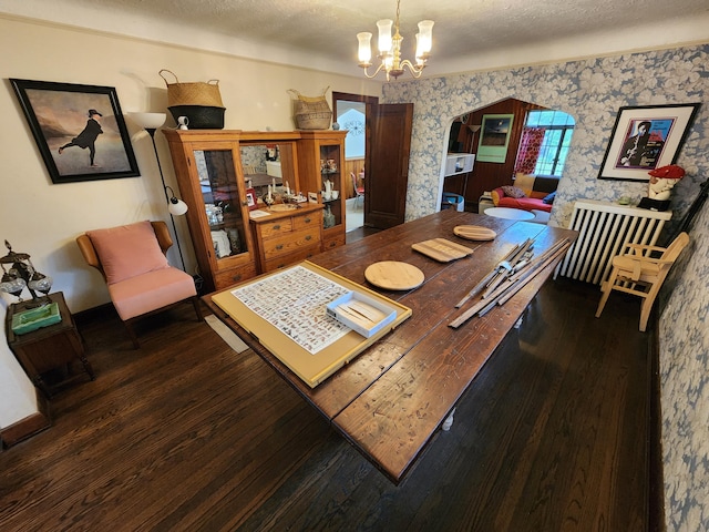 4489 Kensington Ave, Detroit, MI 48224 - dining area with hardwood / wood-style floors, a chandelier, wallpapered walls, and a textured ceiling