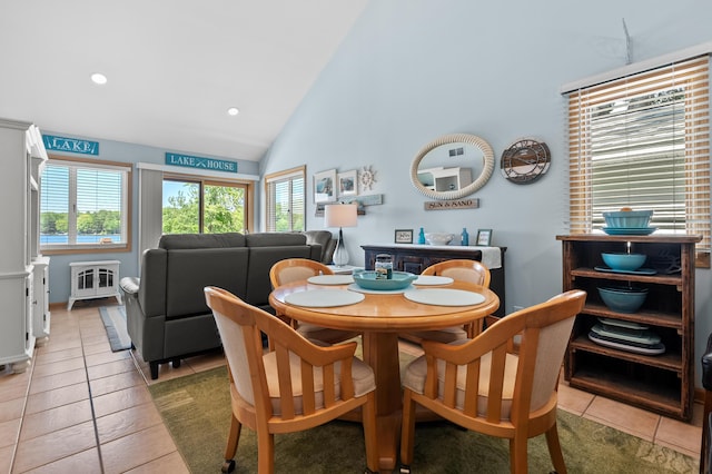 8843 Silver Lake Rd, Grand Junction, MI 49056 - dining space with healthy amount of natural light, recessed lighting, high vaulted ceiling, and light tile patterned floors