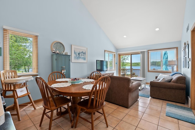 8843 Silver Lake Rd, Grand Junction, MI 49056 - dining room featuring high vaulted ceiling, light tile patterned floors, baseboards, and recessed lighting