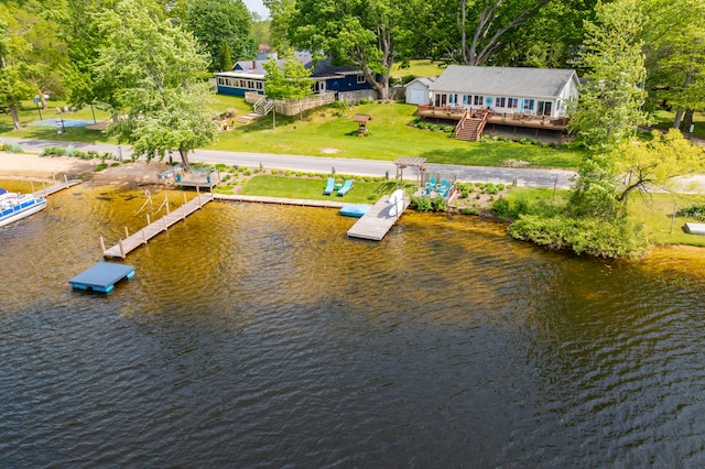 8843 Silver Lake Rd, Grand Junction, MI 49056 - dock area with a lawn and a deck with water view
