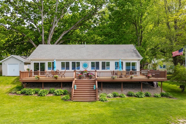 8843 Silver Lake Rd, Grand Junction, MI 49056 - back of house with a deck, stairway, and a lawn