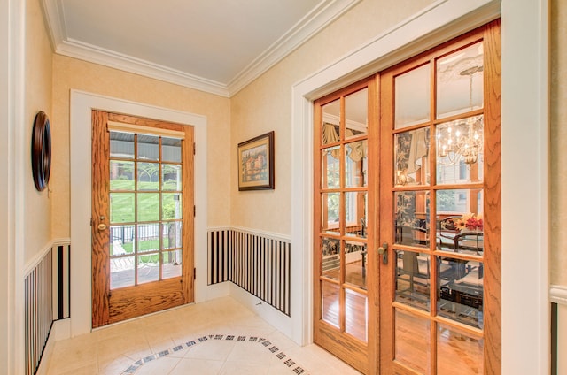 902 Oakridge Dr, Jackson, MI 49203 - doorway with tile patterned flooring, ornamental molding, french doors, inlaid floor details, and a chandelier