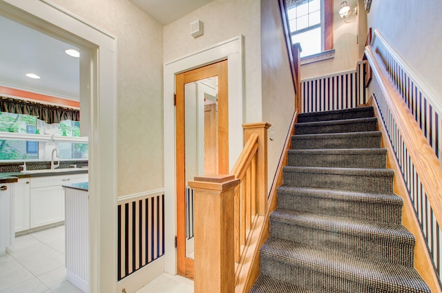 902 Oakridge Dr, Jackson, MI 49203 - stairs featuring tile patterned floors and recessed lighting
