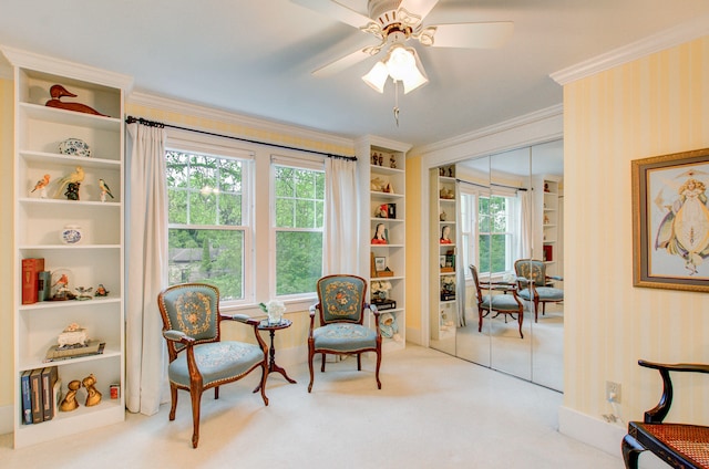 902 Oakridge Dr, Jackson, MI 49203 - living area featuring ornamental molding, ceiling fan, carpet flooring, and wallpapered walls