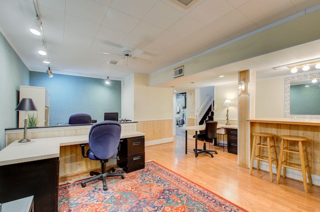 902 Oakridge Dr, Jackson, MI 49203 - office space featuring light wood finished floors, a wainscoted wall, ornamental molding, a ceiling fan, and rail lighting