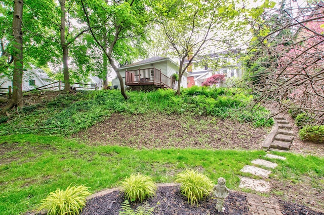 902 Oakridge Dr, Jackson, MI 49203 - view of yard featuring a wooden deck