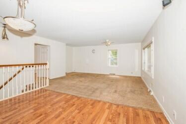 221 S Taylor St, New Buffalo, MI 49117 - unfurnished room with wood finished floors