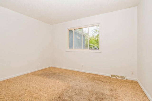 221 S Taylor St, New Buffalo, MI 49117 - empty room with light colored carpet and baseboards