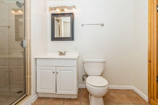 221 S Taylor St, New Buffalo, MI 49117 - bathroom featuring a shower stall, vanity, baseboards, toilet, and tile patterned floors