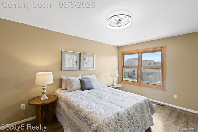 20605 Hickory St, Woodhaven, MI 48183 - bedroom featuring baseboards and wood finished floors
