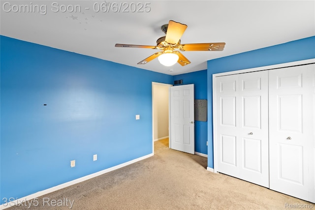 20605 Hickory St, Woodhaven, MI 48183 - unfurnished bedroom with carpet floors, baseboards, a closet, and a ceiling fan