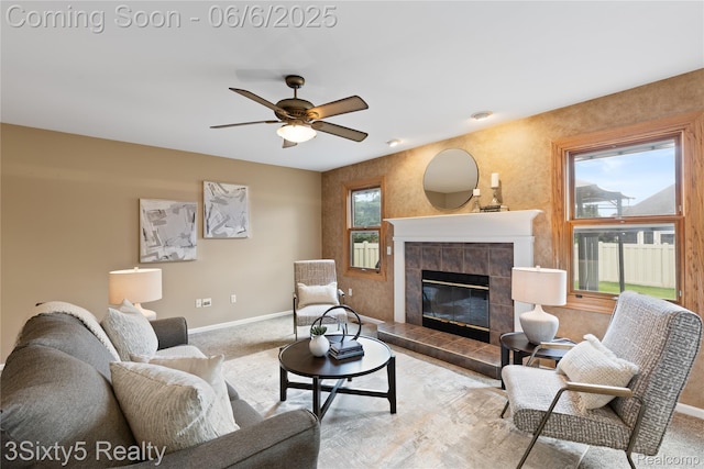20605 Hickory St, Woodhaven, MI 48183 - carpeted living area featuring baseboards, a tile fireplace, and ceiling fan