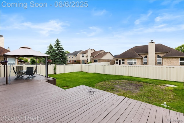 20605 Hickory St, Woodhaven, MI 48183 - wooden deck with a gazebo, outdoor dining area, and a residential view