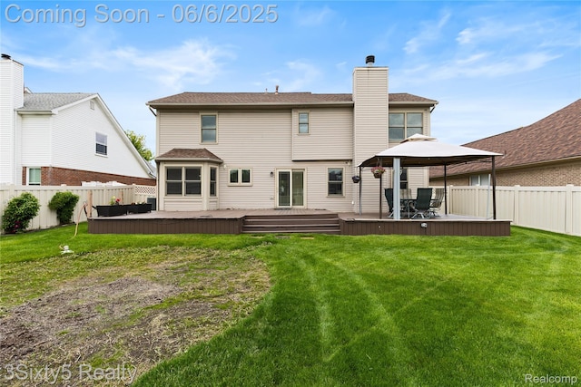20605 Hickory St, Woodhaven, MI 48183 - rear view of property featuring a gazebo, a chimney, and a deck