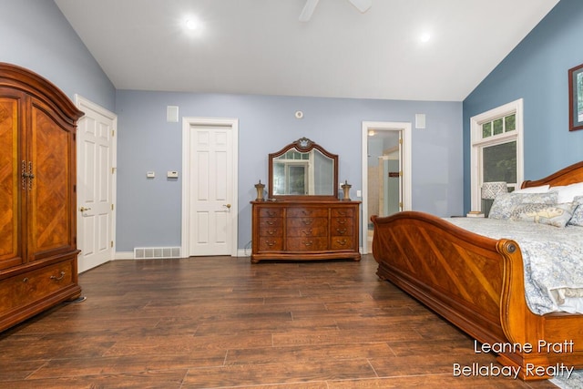 1020 E Woodlawn Ave, Hastings, MI 49058 - bedroom with vaulted ceiling, wood finished floors, a ceiling fan, ensuite bathroom, and baseboards