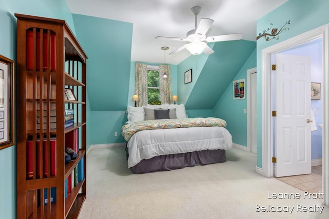 1020 E Woodlawn Ave, Hastings, MI 49058 - bedroom with carpet, baseboards, vaulted ceiling, and a ceiling fan