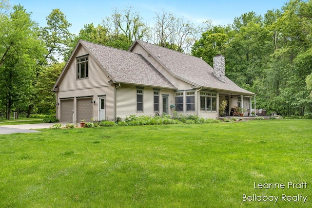 1020 E Woodlawn Ave, Hastings, MI 49058 - view of front of home featuring a chimney, a front lawn, and roof with shingles