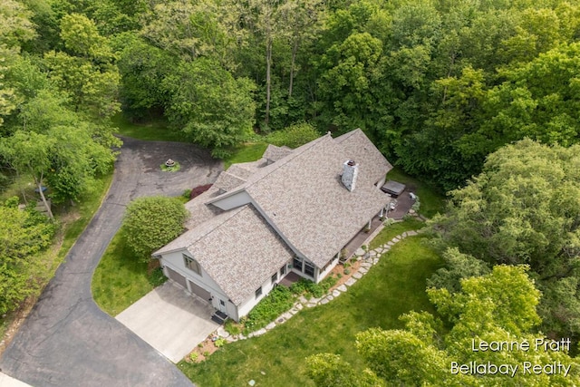 1020 E Woodlawn Ave, Hastings, MI 49058 - aerial view of property and surrounding area featuring a forest