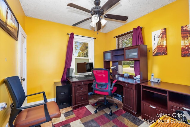 772 26th St SW, Wyoming, MI 49509 - office with ceiling fan and a textured ceiling
