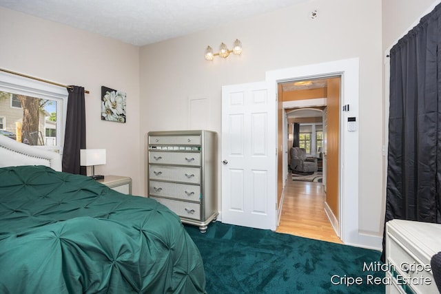 772 26th St SW, Wyoming, MI 49509 - bedroom featuring dark carpet