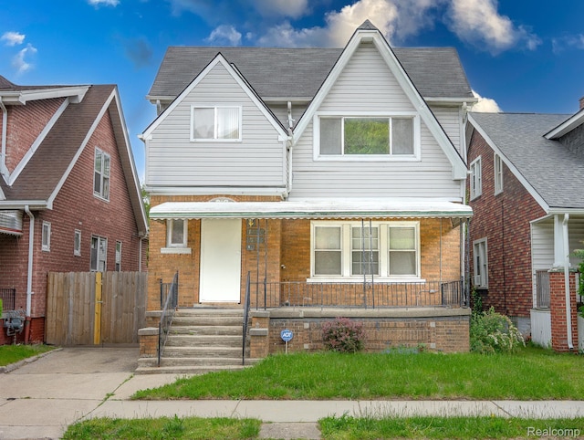 15859 Cloverlawn St, Detroit, MI 48238 - view of front of property with covered porch and brick siding