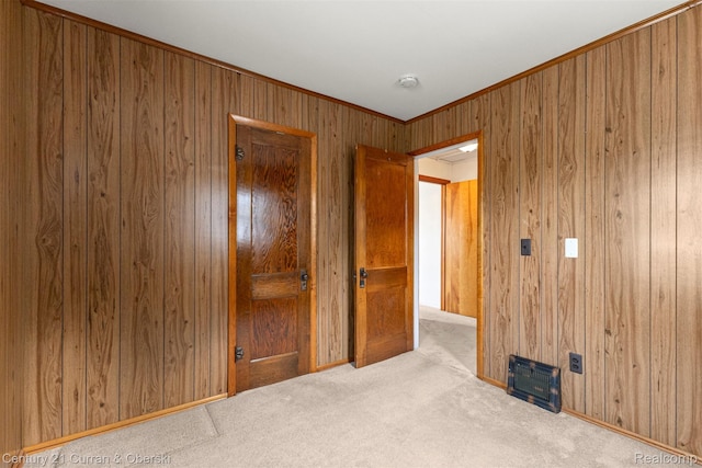 2143 Boldt St, Dearborn, MI 48124 - carpeted spare room featuring wood walls, crown molding, and a smoke detector
