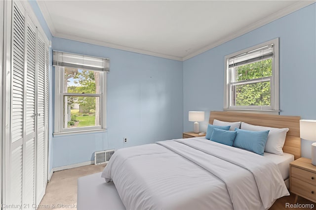2143 Boldt St, Dearborn, MI 48124 - carpeted bedroom with ornamental molding and baseboards