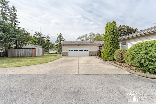 6337 Raymar St, Erie, MI 48133 - view of front of house with a garage and brick siding