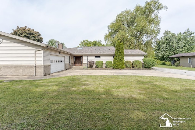 6337 Raymar St, Erie, MI 48133 - ranch-style home with a chimney, a front yard, a garage, and driveway