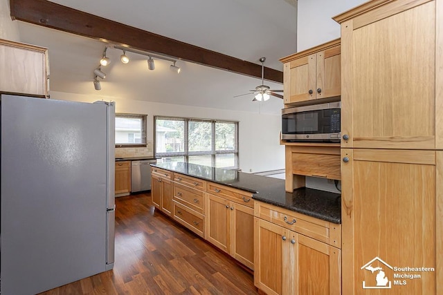 6337 Raymar St, Erie, MI 48133 - kitchen with appliances with stainless steel finishes, a ceiling fan, light brown cabinetry, dark wood finished floors, and dark stone countertops