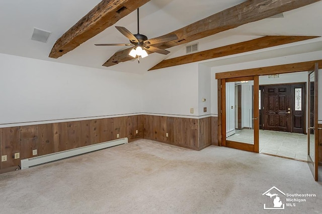 6337 Raymar St, Erie, MI 48133 - empty room featuring a baseboard radiator, a wainscoted wall, a ceiling fan, carpet, and wooden walls