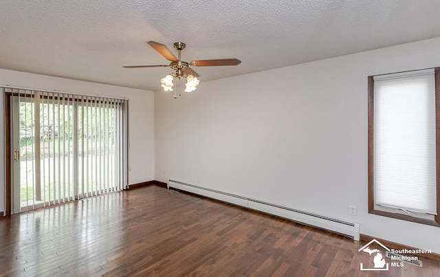 6337 Raymar St, Erie, MI 48133 - unfurnished room with baseboard heating, healthy amount of natural light, wood finished floors, ceiling fan, and a textured ceiling