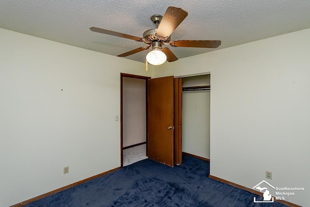 6337 Raymar St, Erie, MI 48133 - unfurnished bedroom featuring dark colored carpet, a closet, baseboards, ceiling fan, and a textured ceiling