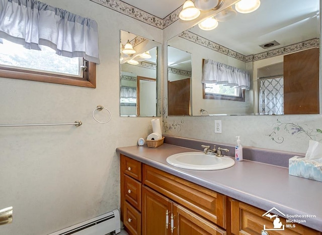 6337 Raymar St, Erie, MI 48133 - bathroom with a baseboard heating unit and vanity
