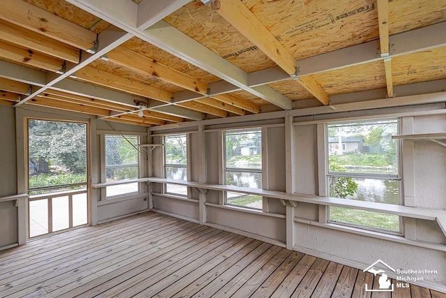 6337 Raymar St, Erie, MI 48133 - unfurnished sunroom featuring a water view and hardwood / wood-style floors