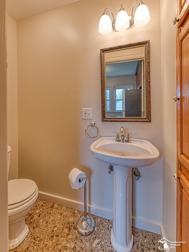 27145 James Ave, Flat Rock, MI 48134 - bathroom with baseboards and toilet