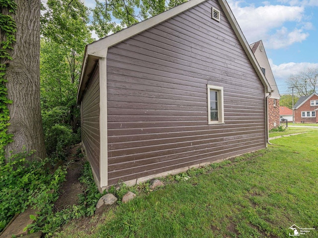 27145 James Ave, Flat Rock, MI 48134 - view of property exterior featuring a yard
