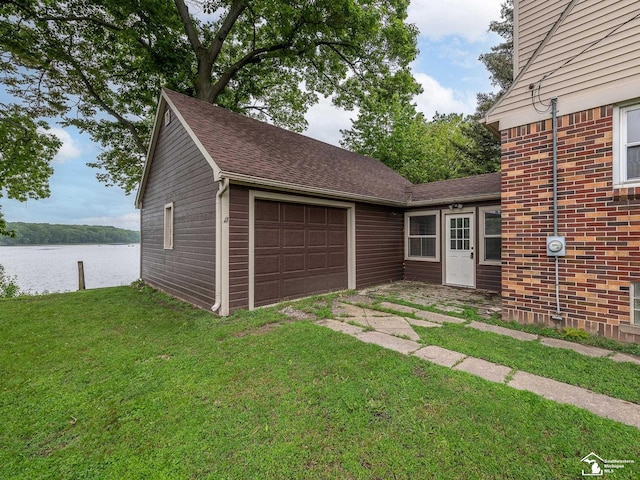 27145 James Ave, Flat Rock, MI 48134 - garage featuring a water view
