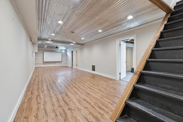 303 E Xy Ave, Vicksburg, MI 49097 - basement featuring stairway, wood finished floors, wood ceiling, recessed lighting, and baseboards